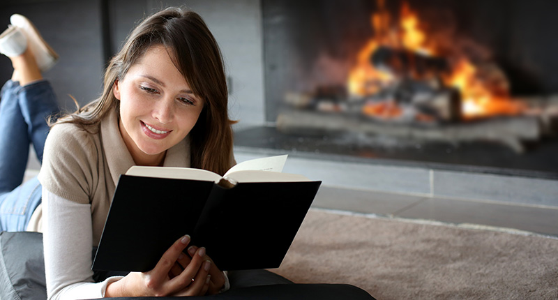 Reading near a fireplace